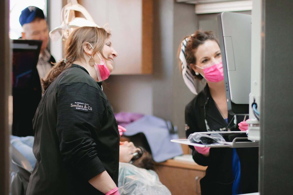 Dr. Nikki Christian and staff providing free dental care to children with Give Kids a Smile®.