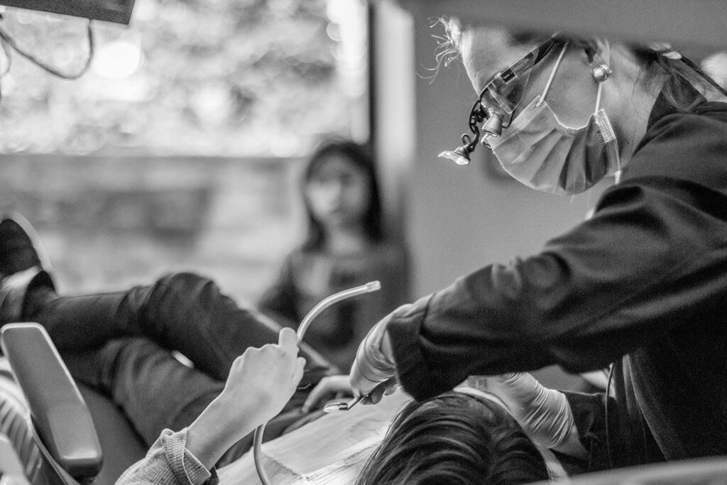 Staff from Kansas City Smiles and Co. providing free dental care for children at the Give Kids a Smile® event.