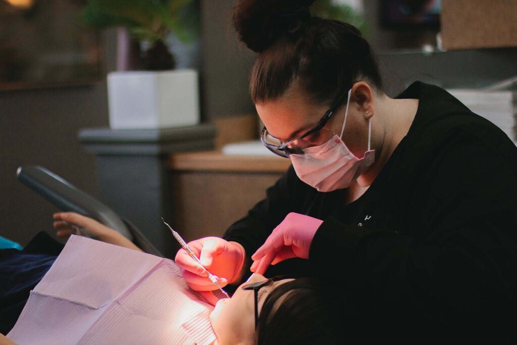 Staff from Kansas City Smiles and Co. providing free dental care for children at the Give Kids a Smile® event.